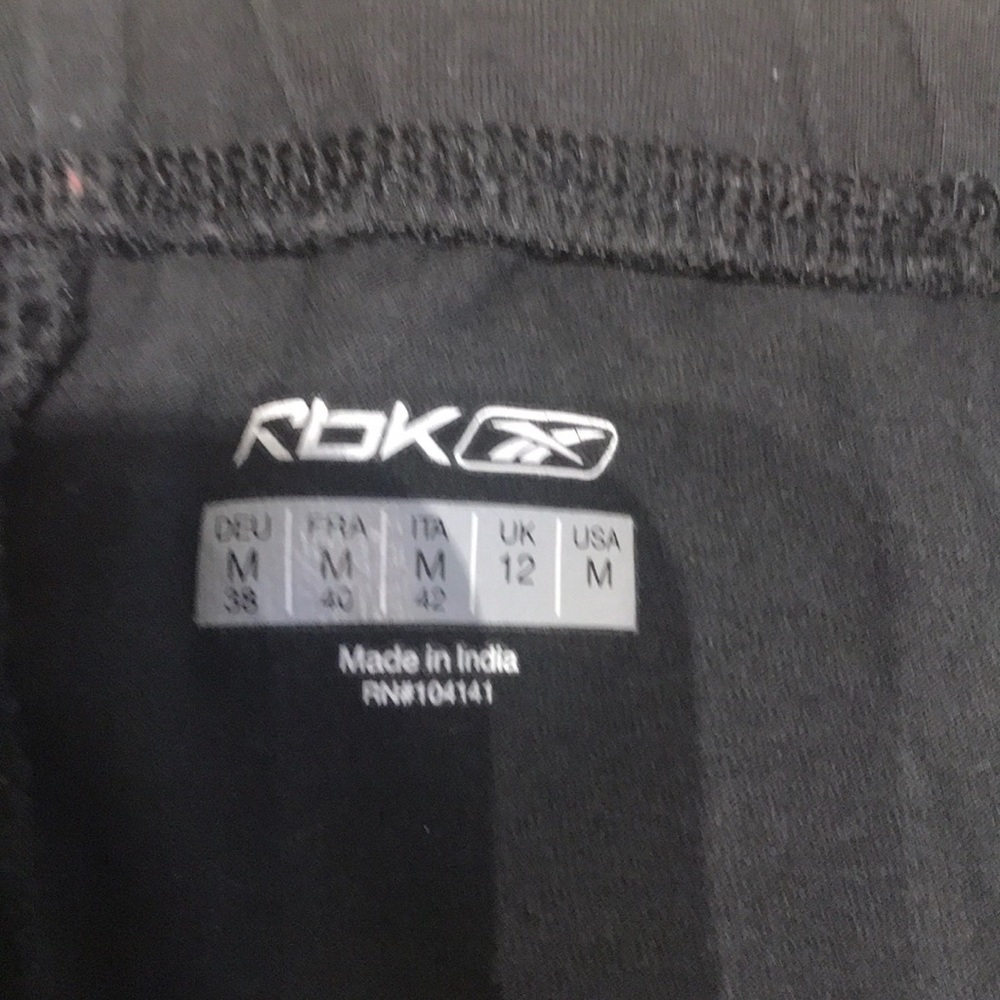 Reebok black tights, size M.